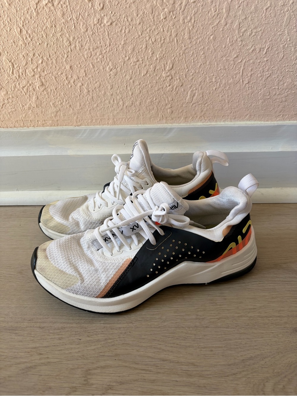 Nike White Athletic Sneakers with Black and Orange Accents